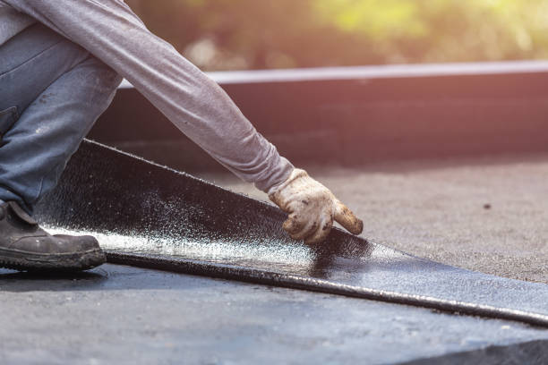 Professional Basement Waterproofing technician working in Arkdale, WI